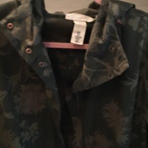 Green trench or rain coat